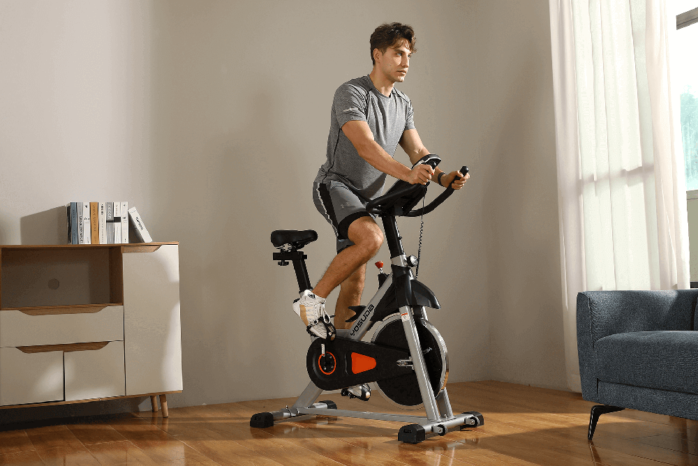 Riding your exercise bike in standing position can double your fat burn